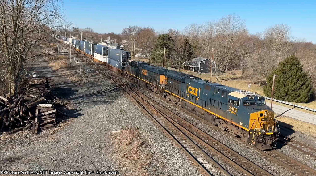 CSX 3403 leads a long stacker with no DPU on the old NYC.